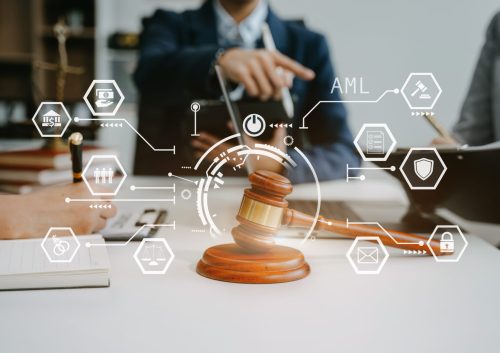 Businessman and Male lawyer or judge consult having team meeting Businessman and Male lawyer or judge consult having team meeting with client, Law and Legal services concept in office.
