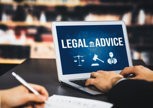 Smart legal advice website for people searching for savvy law knowledge Smart legal advice website for people searching for savvy law knowledge in laptop computer on a desk in library of university or college