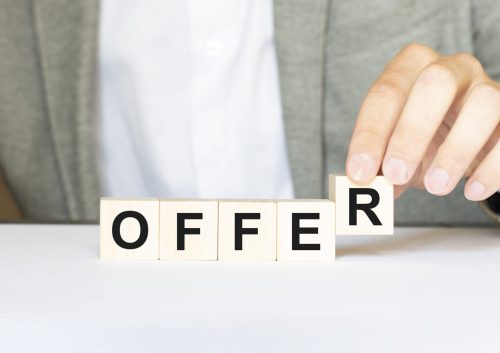 Word OFFER made with wood building blocks Word OFFER made with wood building blocks